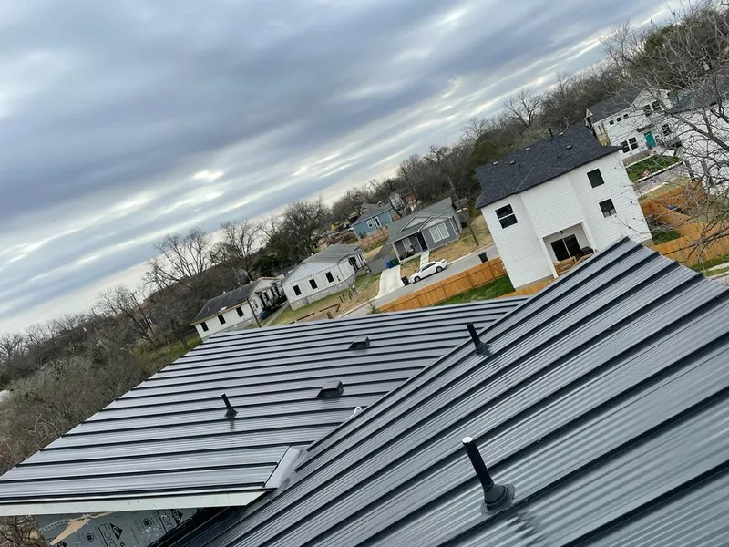 Standing seam metal roof panels with vents for Skylight Repair in Offutt AFB